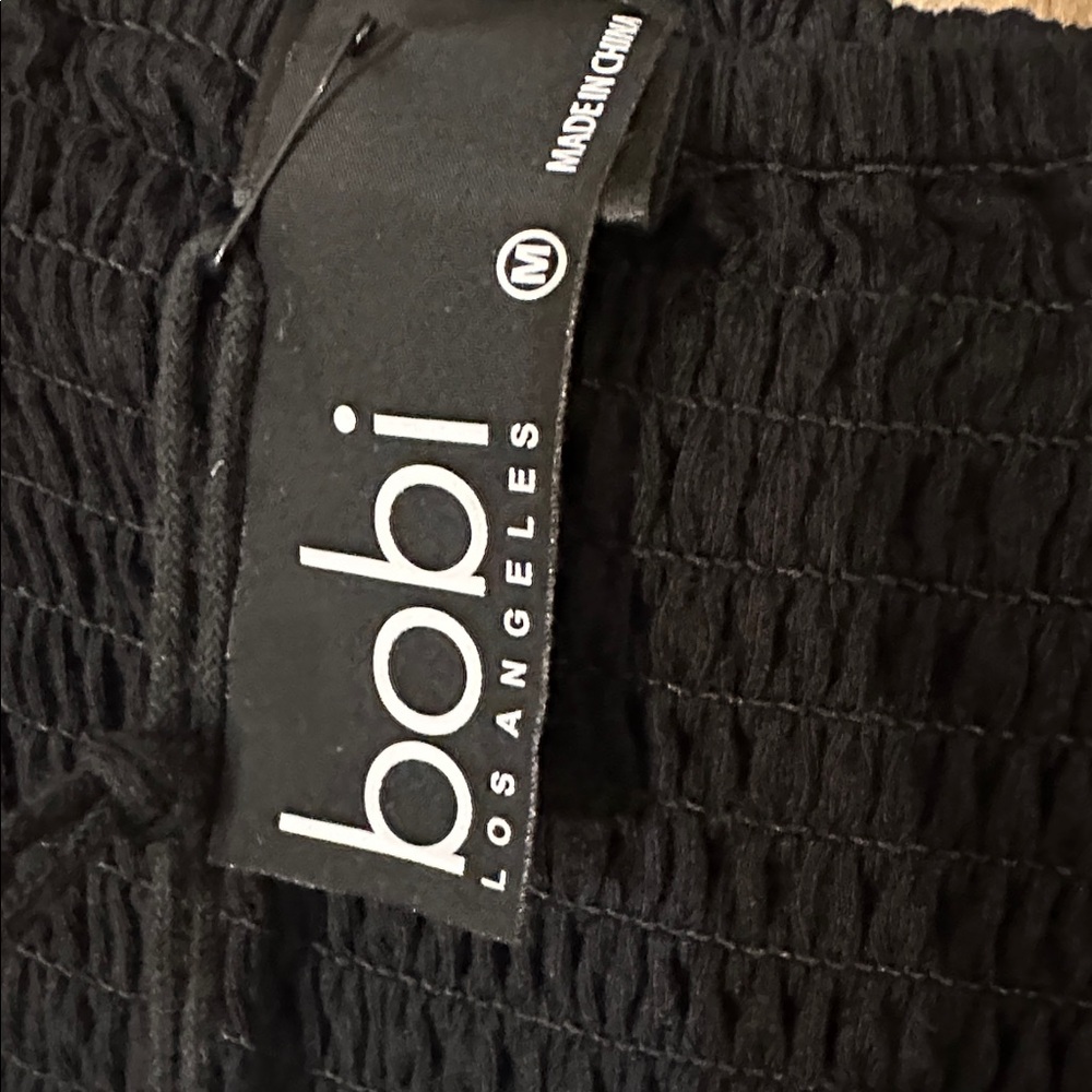 NEW bobi Los Angeles Revolve Black Strapless SlitLeg Smocked Jumpsuit SidePocket - Picture 14 of 15